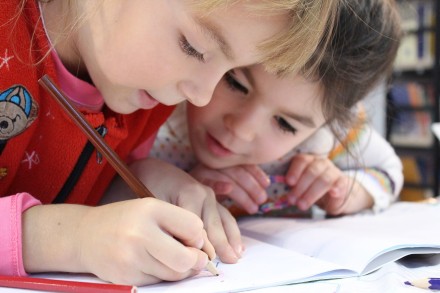 School students learning IGCSE Syllabus